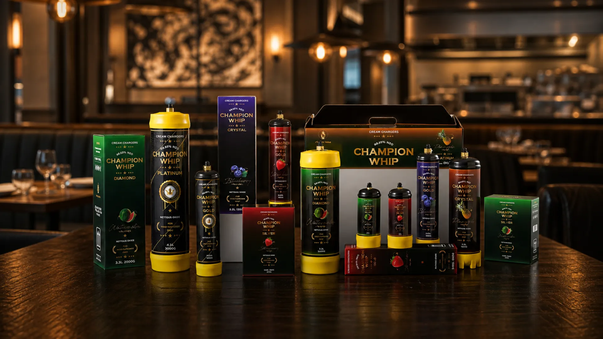 Assorted flavored N2O cylinders in fruit colors lined up on a commercial kitchen counter | Champion Whip